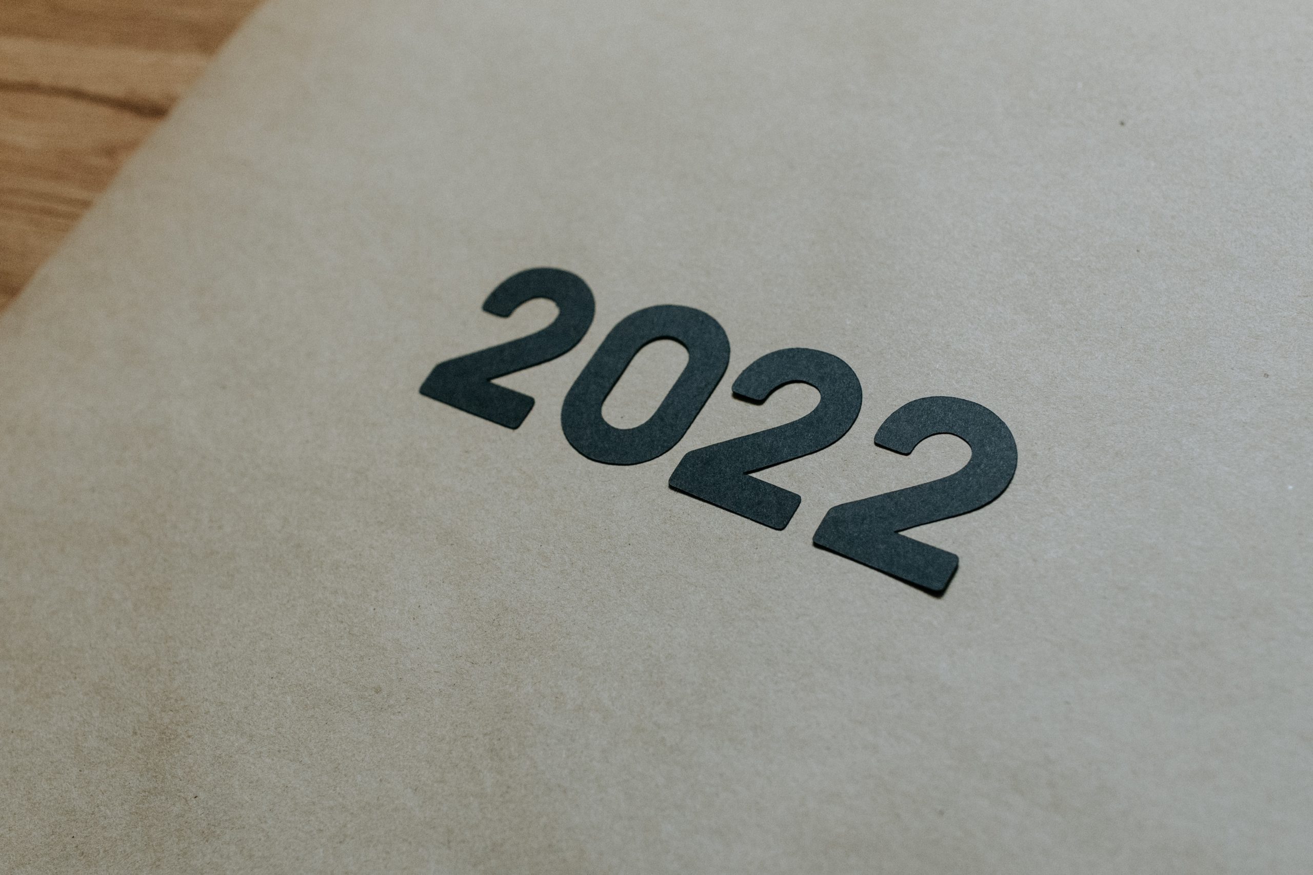 Block numbers 2022 appear on a paper